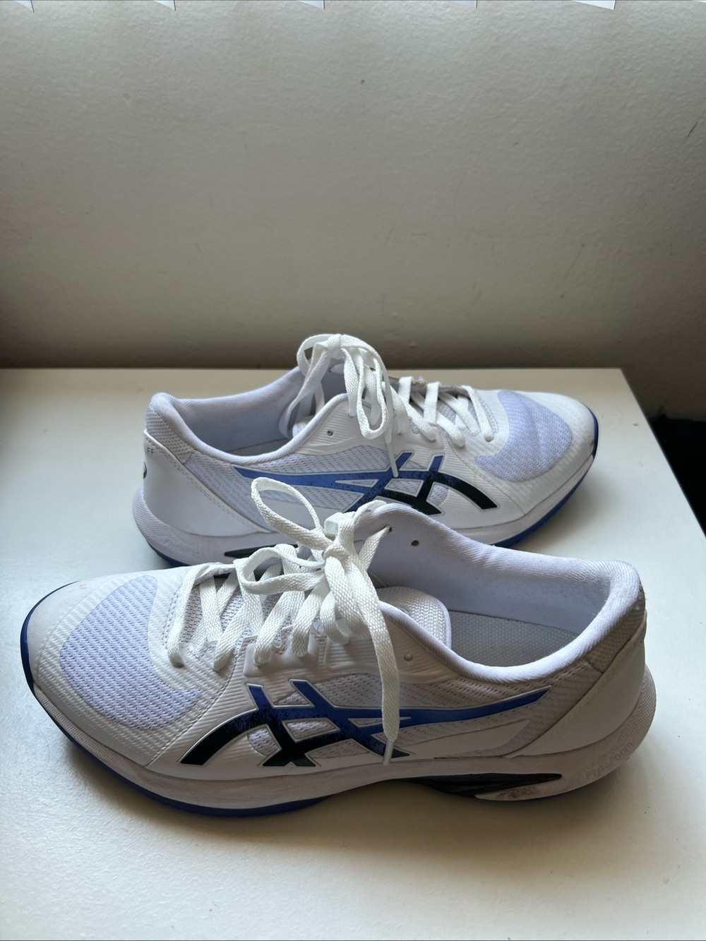ASICS White Athletic Running Shoes with Blue and Black Accents